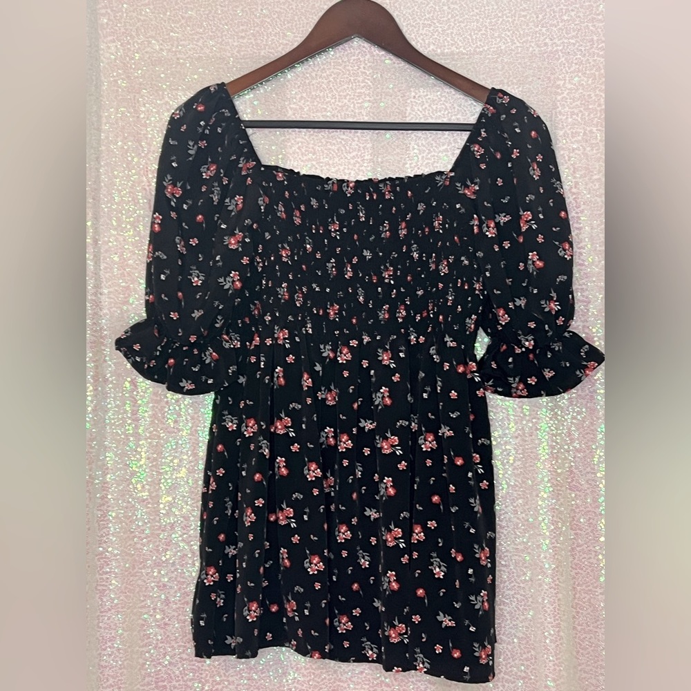 Black and floral ruched bodice top.